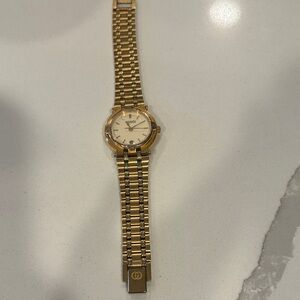 Gucci Gold Watch with White Dial